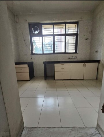 Kitchen in 2.5 BHK Apartment at Oxford Premium, Wanowrie – for Sale