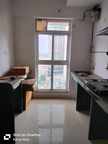 Kitchen in 1.5 BHK Apartment at Godrej Emerald, Ghodbunder Road – for Sale