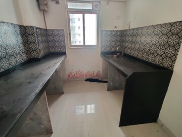 Kitchen in 1 BHK Apartment at Lodha Amara, Kolshet Road – for Sale