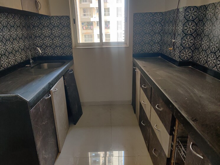 Kitchen, lodha-amara 3 Bedroom 955 Sq.Ft. Apartment In Kolshet Road Thane 7275321