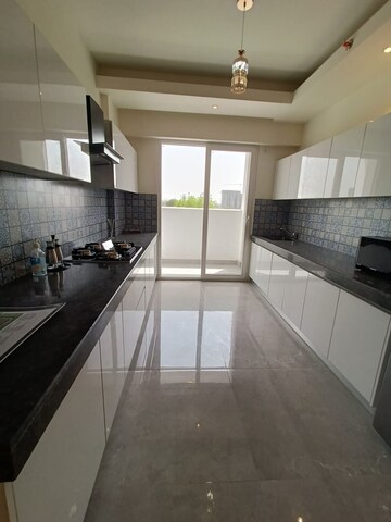 Kitchen in 3.5 BHK Apartment at Godrej Vriksha, Sector 103 – for Sale