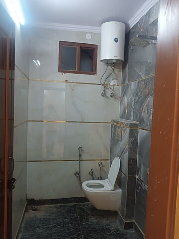 Bathroom in 3 BHK Builder Floor at Dwarka Mor – for Sale