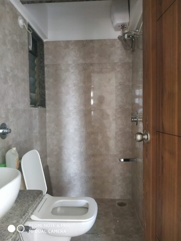 Bathroom in 1 BHK Apartment at Parinee Essence, Kandivali West – for Sale