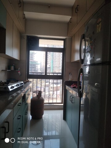 Kitchen in 1 BHK Apartment at Parinee Essence, Kandivali West – for Sale