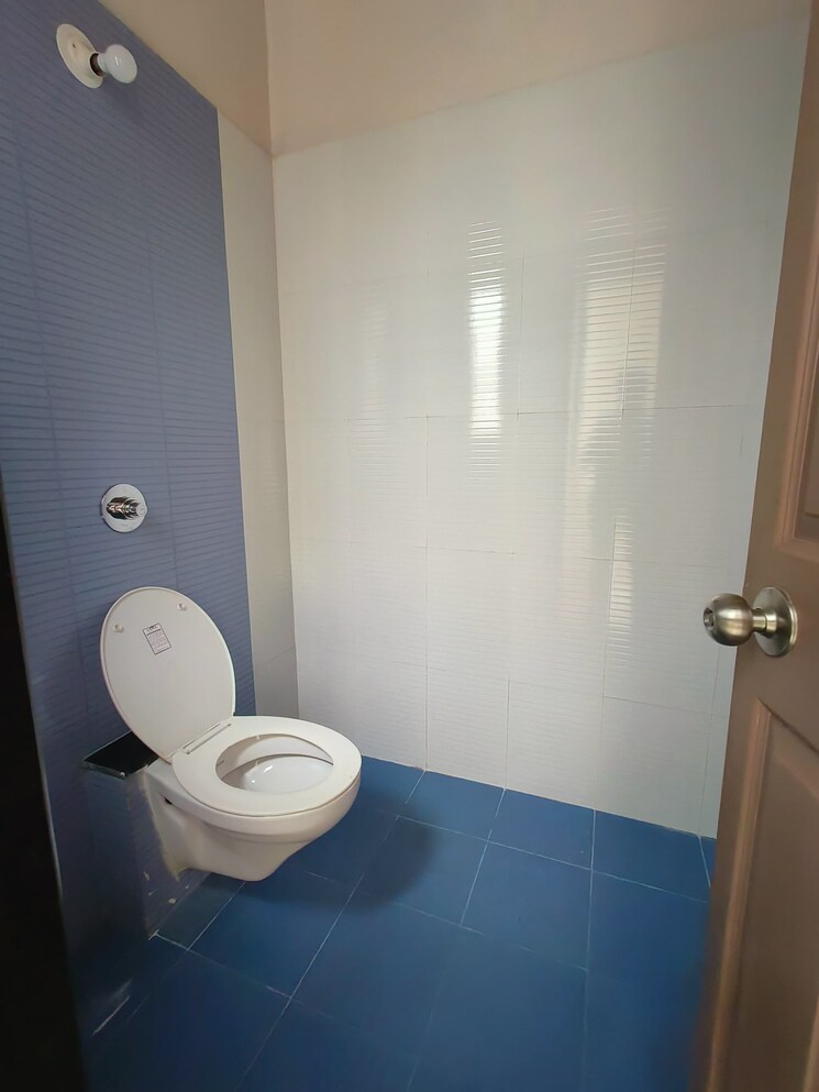 Bathroom, tejas-pooja-poorva-shrushti 2 Bedroom 700 Sq.Ft. Apartment In Nanded Pune 7275601