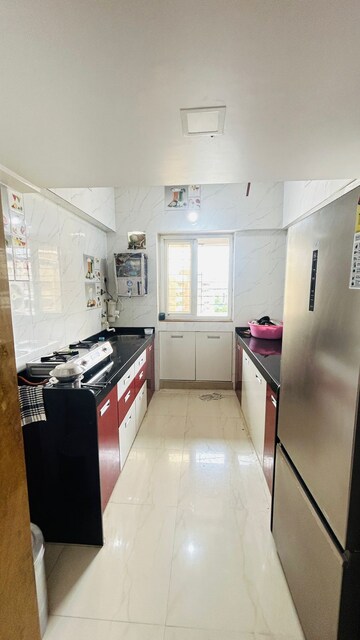 Kitchen in 3 BHK Apartment at Rustomjee Avenue M, Virar West – for Sale