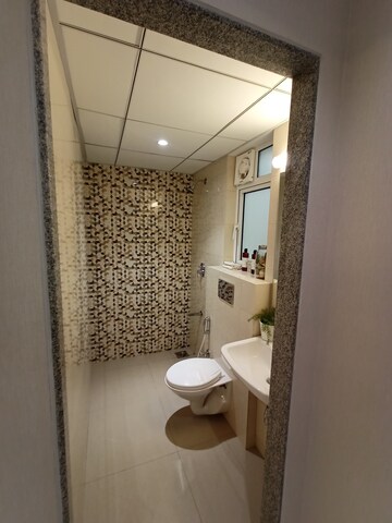 Bathroom in 1 BHK Apartment at Godrej Riviera, Ambivali – for Sale