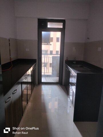 Kitchen in 1.5 BHK Apartment at Lodha Splendora, Ghodbunder Road – for Sale