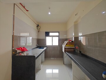 Kitchen in 3 BHK Apartment at Greenfield Om Satyam Niwas CHS, Borivali West – for Sale