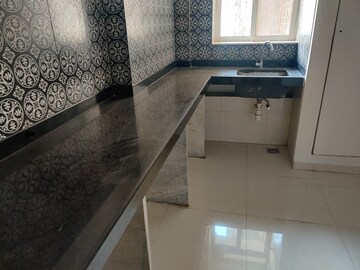 Kitchen in 2 BHK Apartment at Lodha Amara, Kolshet Road – for Sale