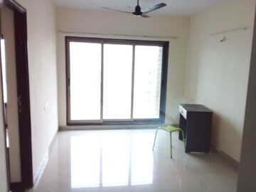 Room in 2 BHK Apartment at Acme Ozone, Manpada – for Sale