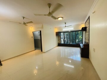 Living Room in 2 BHK Apartment at Bredco New Viceroy Park , Kandivali East – for Sale