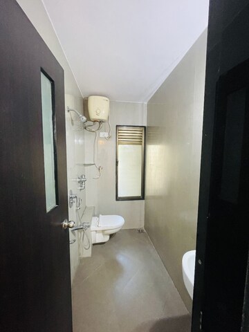 Bathroom in 2 BHK Apartment at Bredco New Viceroy Park , Kandivali East – for Sale