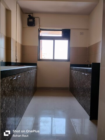 Kitchen in 2.5 BHK Apartment at Lodha Splendora, Ghodbunder Road – for Sale