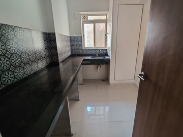 Kitchen in 1.5 BHK Apartment at Lodha Amara, Kolshet Road – for Sale