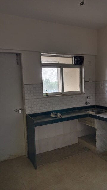Kitchen in 1 BHK Apartment at Rosa Elite, Bhayandarpada – for Sale