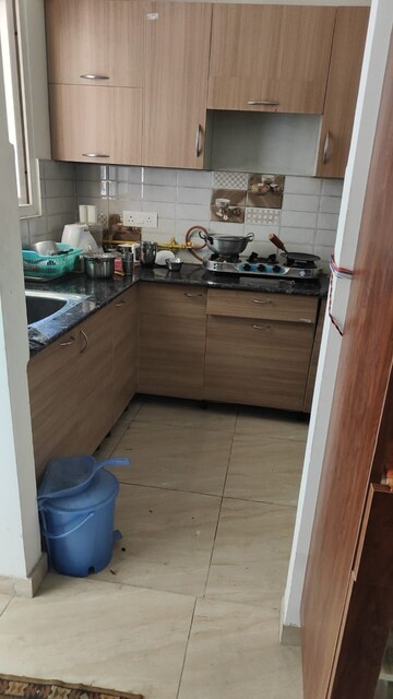 Kitchen in 4 BHK Apartment at Gaur Atulyam, Omicron I Greater Noida – for Sale