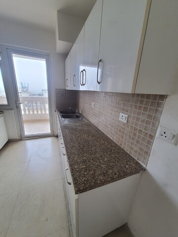 Kitchen in 3 BHK Apartment at DLF The Skycourt, Sector 86 – for Sale