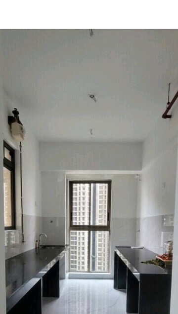 Room in 2 BHK Apartment at Rutu Estate, Brahmand – for Sale