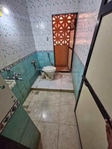 Bathroom in 2 BHK Apartment at Ram Krishna CHS, Louis Wadi – for Sale