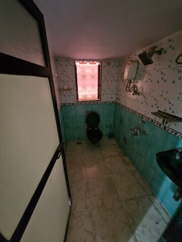 Attached Bathroom in 2 BHK Apartment at Ram Krishna CHS, Louis Wadi – for Sale