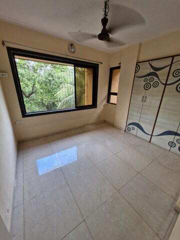 Bedroom in 2 BHK Apartment at Ram Krishna CHS, Louis Wadi – for Sale