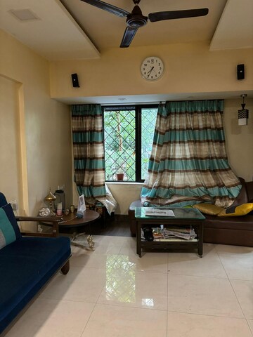 Living Room in 3 BHK Apartment at Riddhi Gardens CHS, Malad East – for Sale