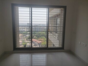 Room in 2 BHK Apartment at Acme Ozone, Manpada – for Sale