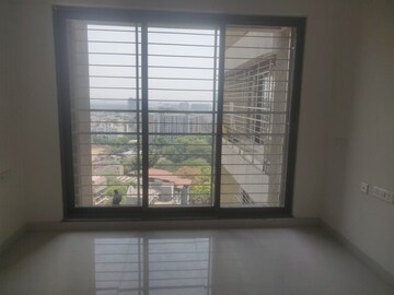 Room in 2 BHK Apartment at Acme Ozone, Manpada – for Sale