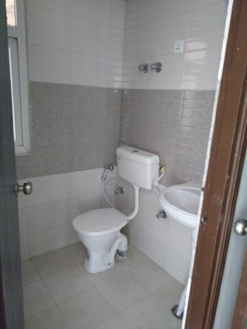 Bathroom in 2 BHK Apartment at Signature Global Orchard Avenue, Sector 93 – for Sale