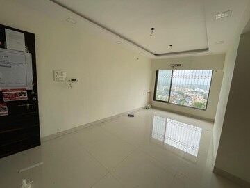 Bedroom in 2 BHK Apartment at Om Dronagiri CHS, Borivali East – for Sale