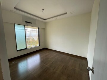 Master Bedroom in 2 BHK Apartment at Om Dronagiri CHS, Borivali East – for Sale
