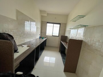 Kitchen in 2 BHK Apartment at Om Dronagiri CHS, Borivali East – for Sale
