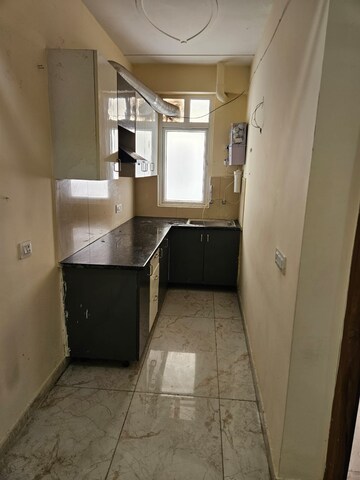 Kitchen in 2 BHK Builder Floor at Noida Central – for Sale