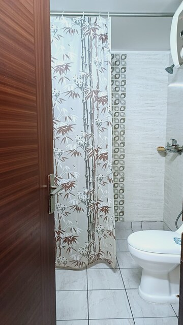 Bathroom in 3.5 BHK Apartment at Gulshan Ikebana, Sector 143 – for Sale