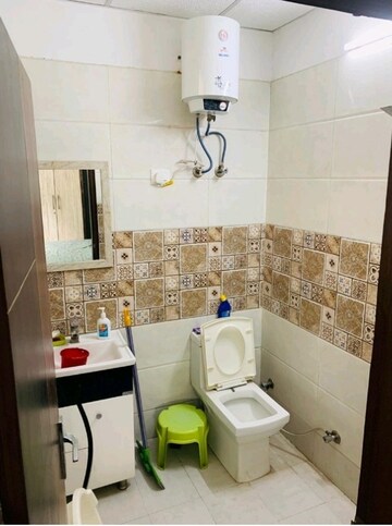 Bathroom in 3 BHK Builder Floor at Niti Khand I – for Sale