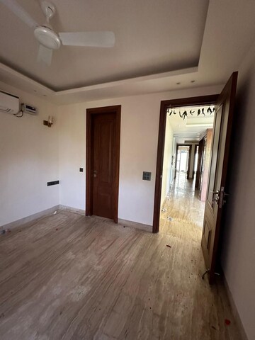 Bedroom in 4 BHK Builder Floor at Freedom Fighters Enclave – for Sale