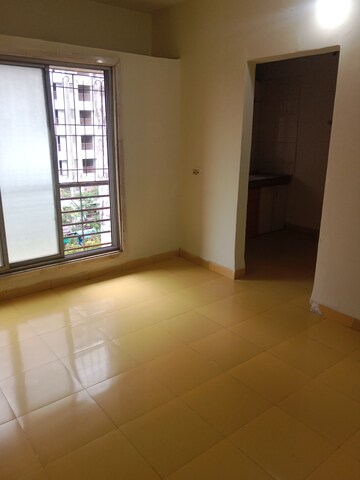 Living Room in 1 BHK Apartment at Rashmi Star City, Naigaon East – for Sale
