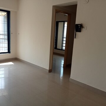 Living Room in 1 BHK Apartment at Kavya Hill View CHS, Anand Nagar – for Sale