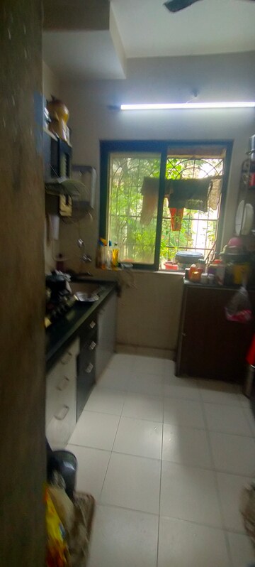 Kitchen in 1 BHK Apartment at Vijay Park, Kasarvadavali – for Sale