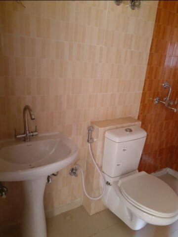 Bathroom in 2 BHK Apartment at Super Realtech Oxy Homez, Defence Colony – for Sale