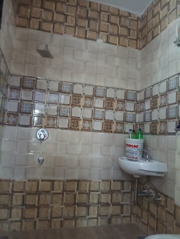 Bathroom in 3 BHK Apartment at Shri Devaji Residency, Dhakoli Village – for Sale
