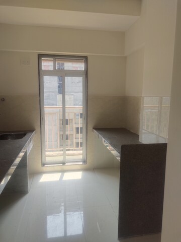 Kitchen in 1 BHK Apartment at Anant Metropolis Aquaris Phase 2, Kasarvadavali – for Sale