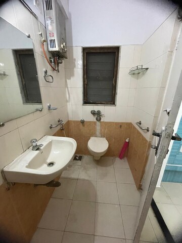 Bathroom in 2 BHK Apartment at Sheth Vasant Sagar Complex, Kandivali East – for Sale