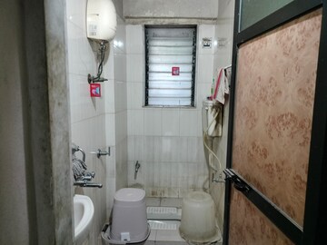 Bathroom in 1 BHK Apartment at Dedhia Harshgiri, Dahisar East – for Sale