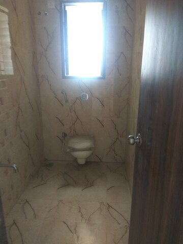 Bathroom in 2 BHK Apartment at Abrol Avirahi Heights, Malad West – for Sale