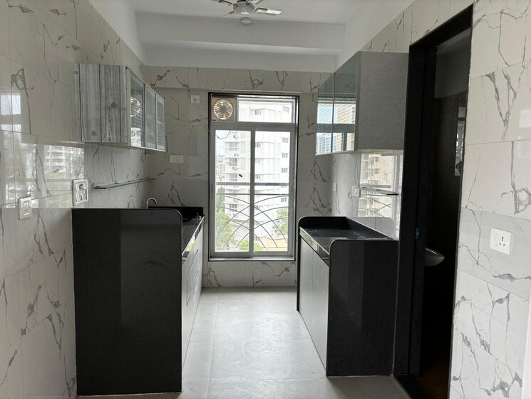 Kitchen, oyster-shell 3 Bedroom 1450 Sq.Ft. Apartment In Juhu Mumbai 7289427