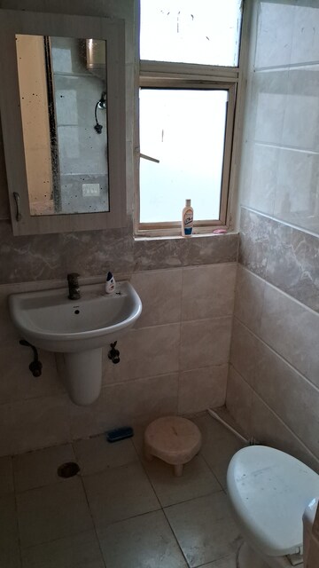 Bathroom in 2.5 BHK Apartment at Amrapali Silicon City, Sector 76 – for Sale
