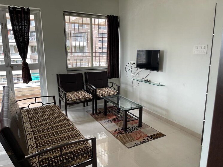Living Room, phadnis-sahil-serene 1 Bedroom 639 Sq.Ft. Apartment In Baner Pune 7290210