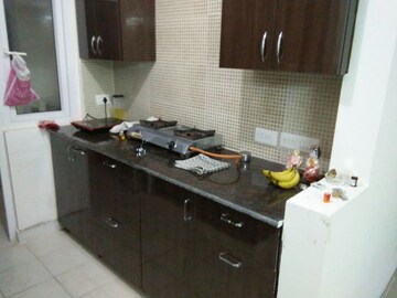Kitchen in 2 BHK Apartment at Amrapali Silicon City, Sector 76 – for Sale